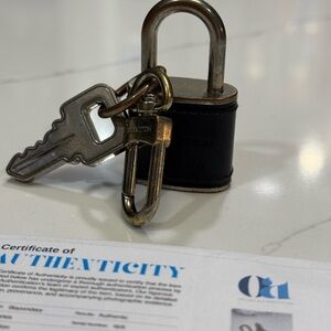 Louis Vuitton Black Leather Keychain with Lock charm